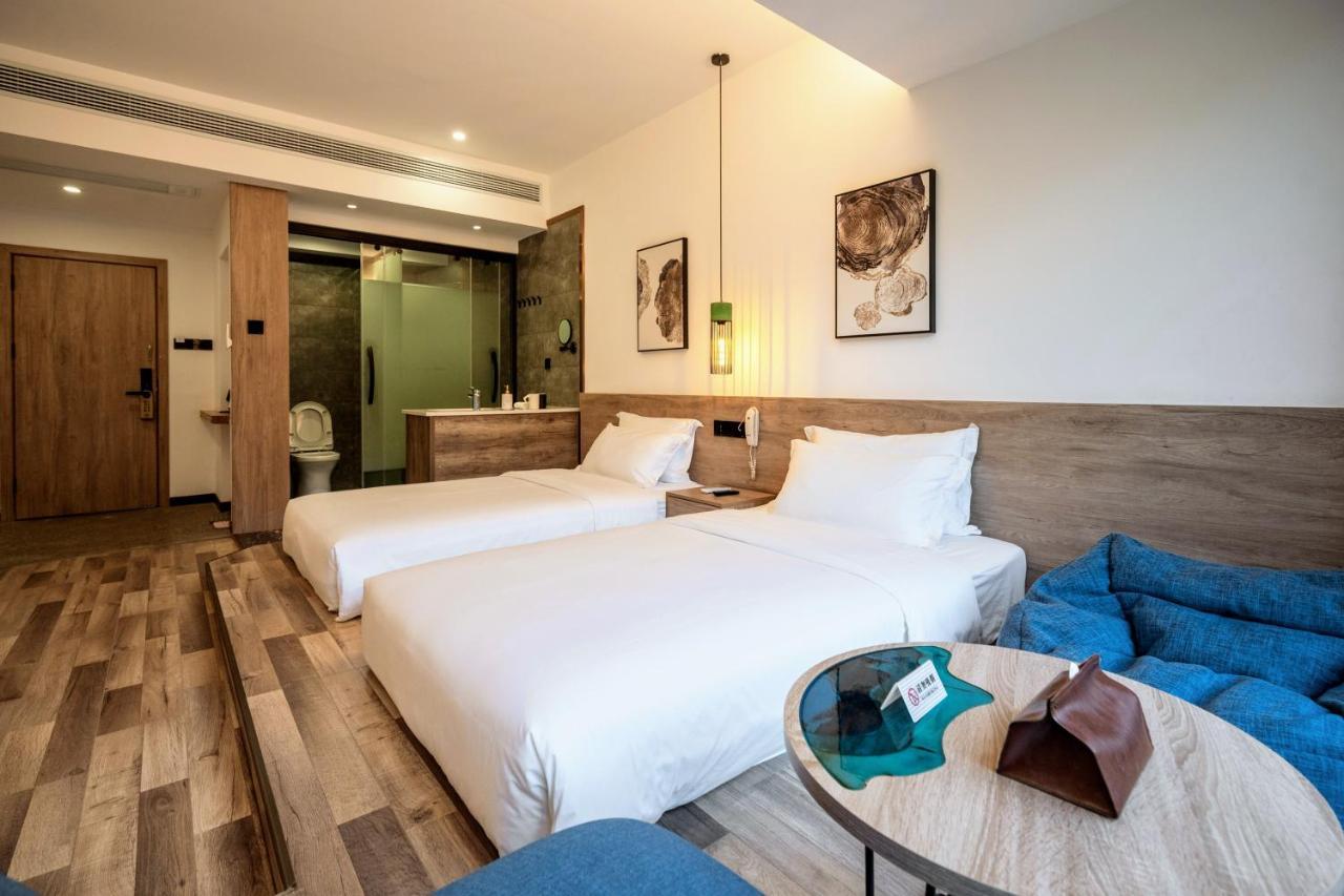 Whispering Mountains Boutique Hotel จางเจียเจี้ย ภายนอก รูปภาพ