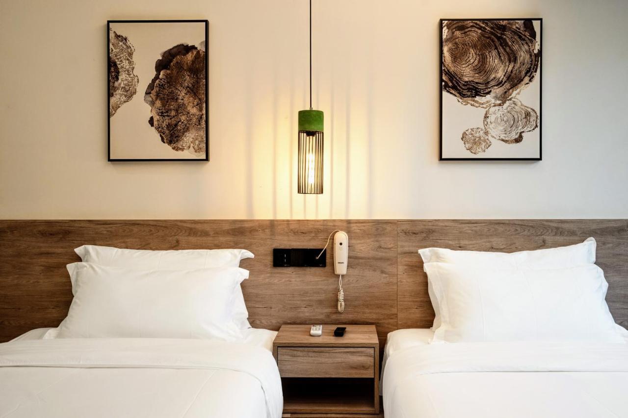 Whispering Mountains Boutique Hotel จางเจียเจี้ย ภายนอก รูปภาพ