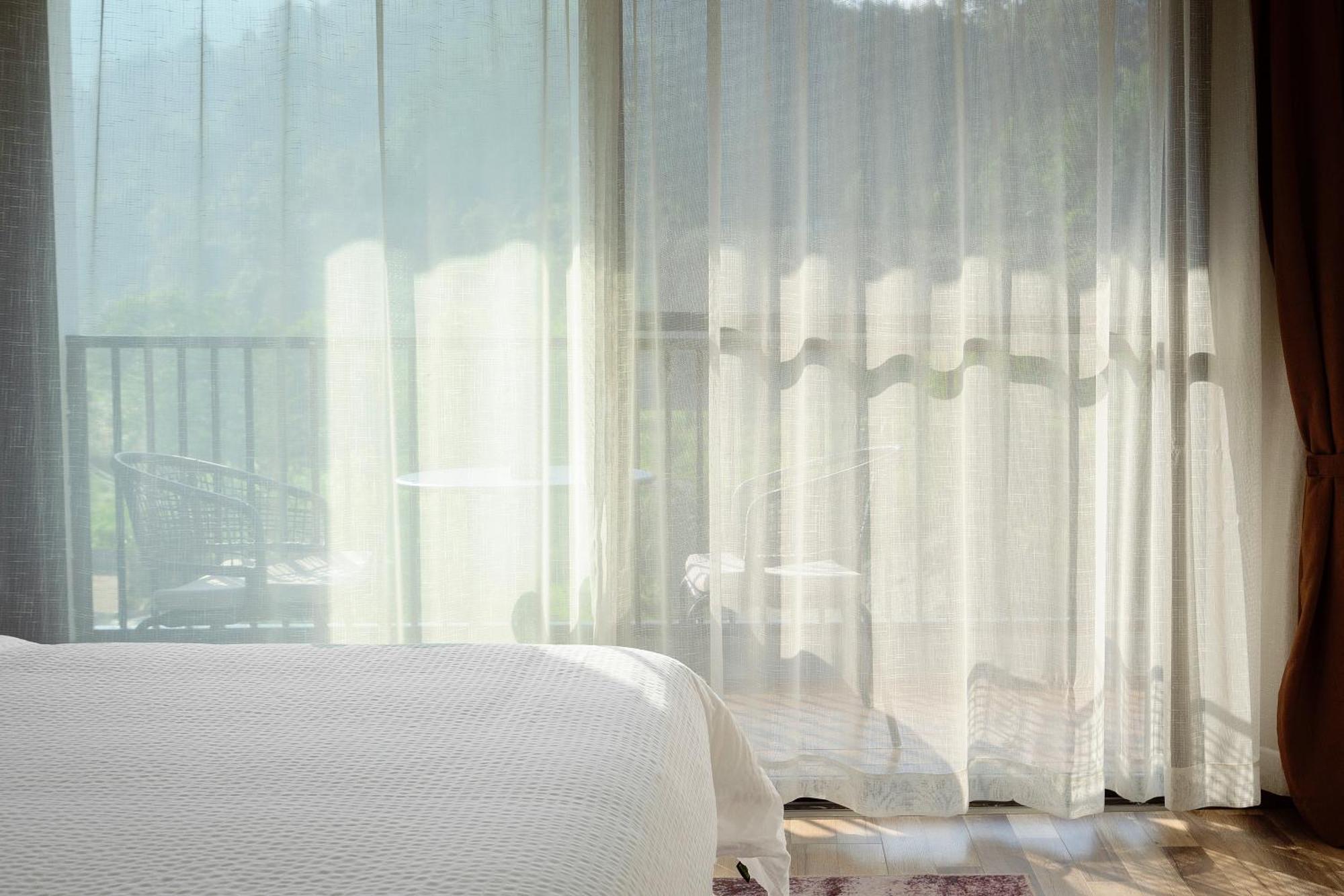 Whispering Mountains Boutique Hotel จางเจียเจี้ย ภายนอก รูปภาพ
