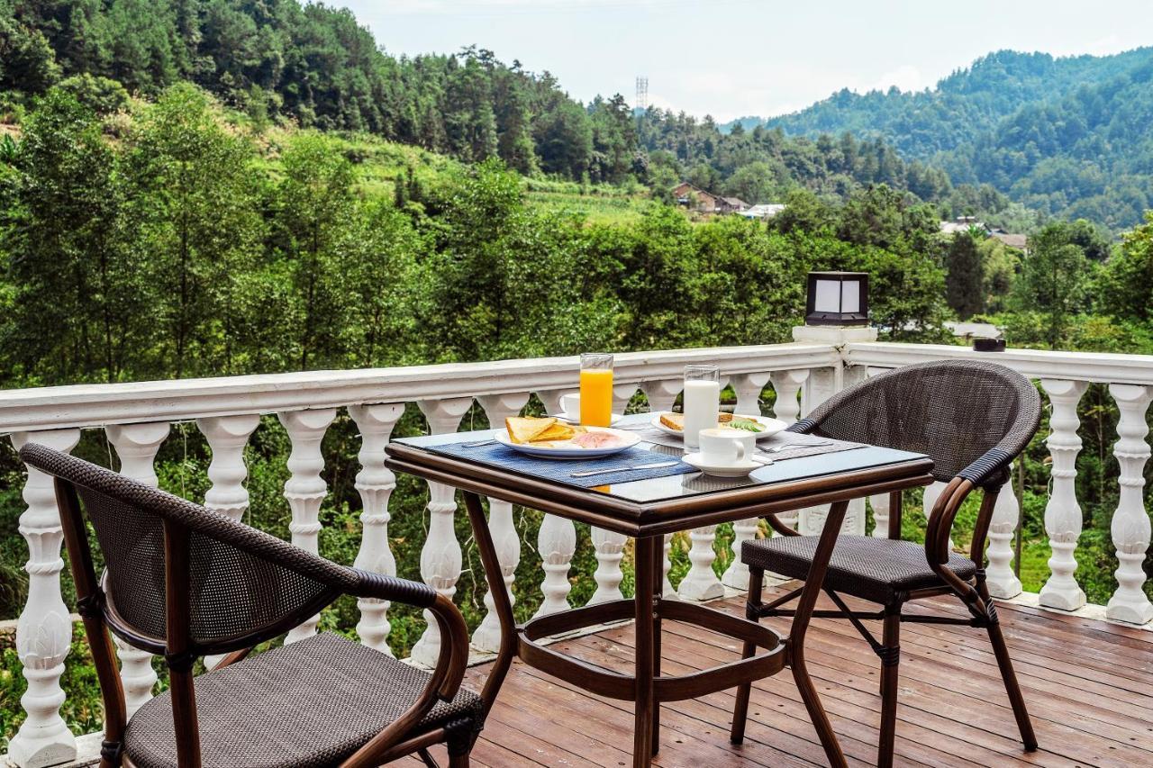 Whispering Mountains Boutique Hotel จางเจียเจี้ย ภายนอก รูปภาพ