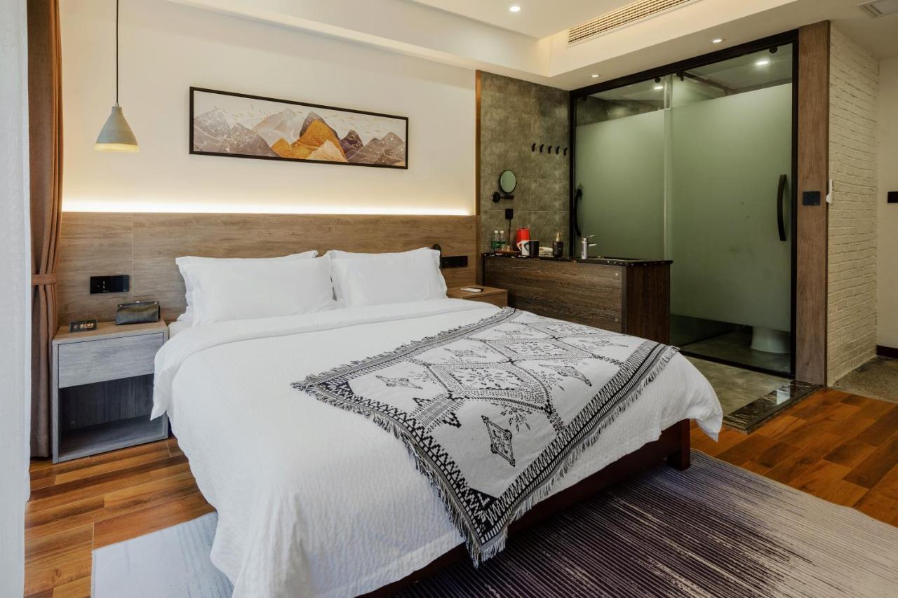 Whispering Mountains Boutique Hotel จางเจียเจี้ย ภายนอก รูปภาพ