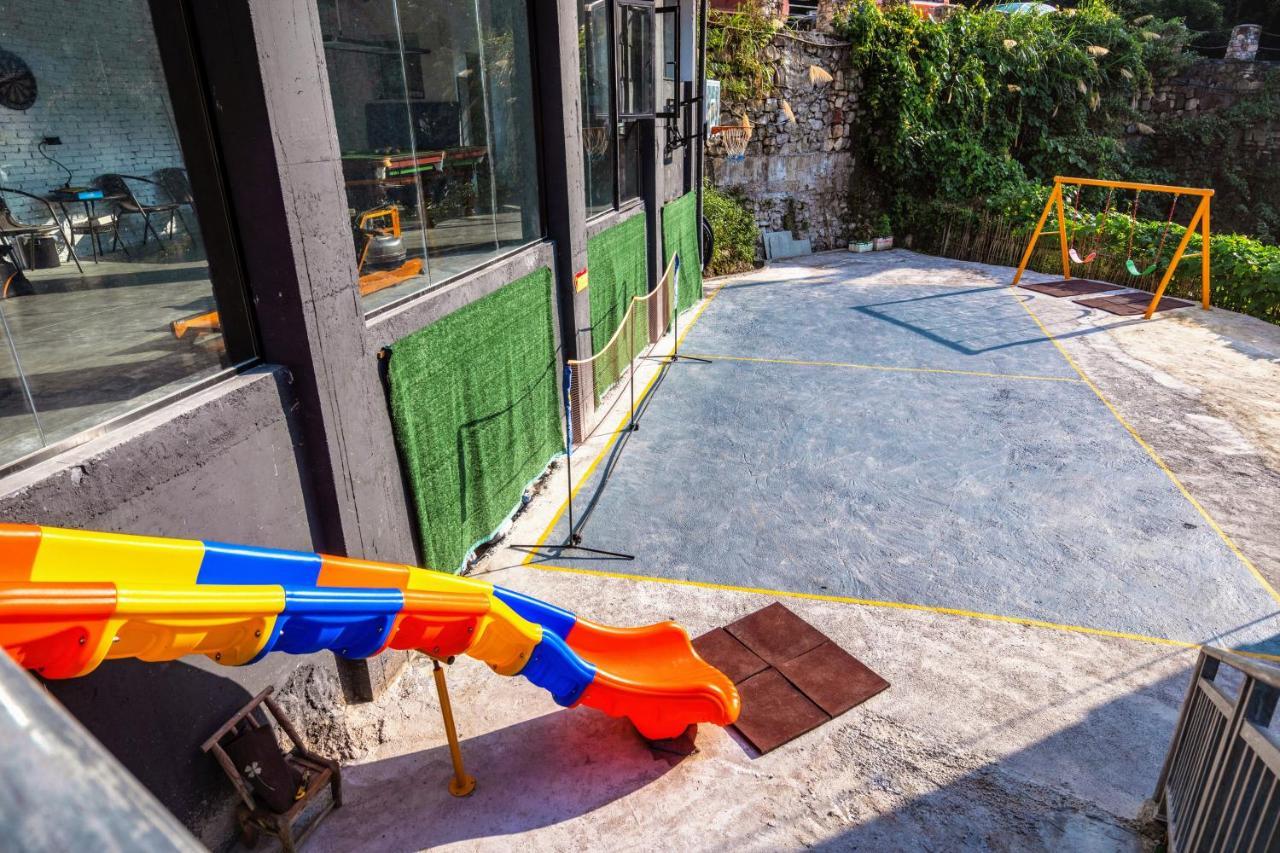 Whispering Mountains Boutique Hotel จางเจียเจี้ย ภายนอก รูปภาพ