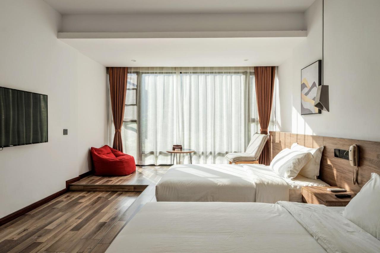 Whispering Mountains Boutique Hotel จางเจียเจี้ย ภายนอก รูปภาพ