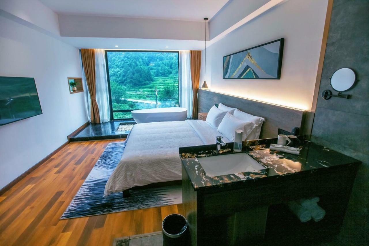 Whispering Mountains Boutique Hotel จางเจียเจี้ย ภายนอก รูปภาพ