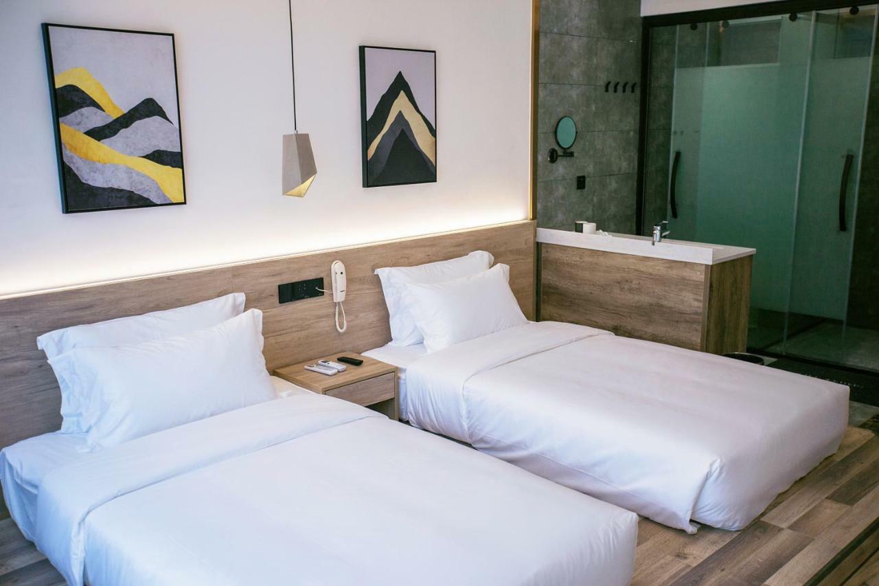 Whispering Mountains Boutique Hotel จางเจียเจี้ย ภายนอก รูปภาพ