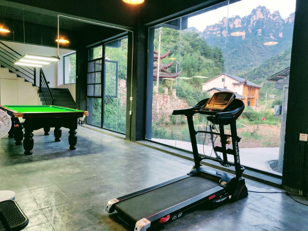 Whispering Mountains Boutique Hotel จางเจียเจี้ย ภายนอก รูปภาพ