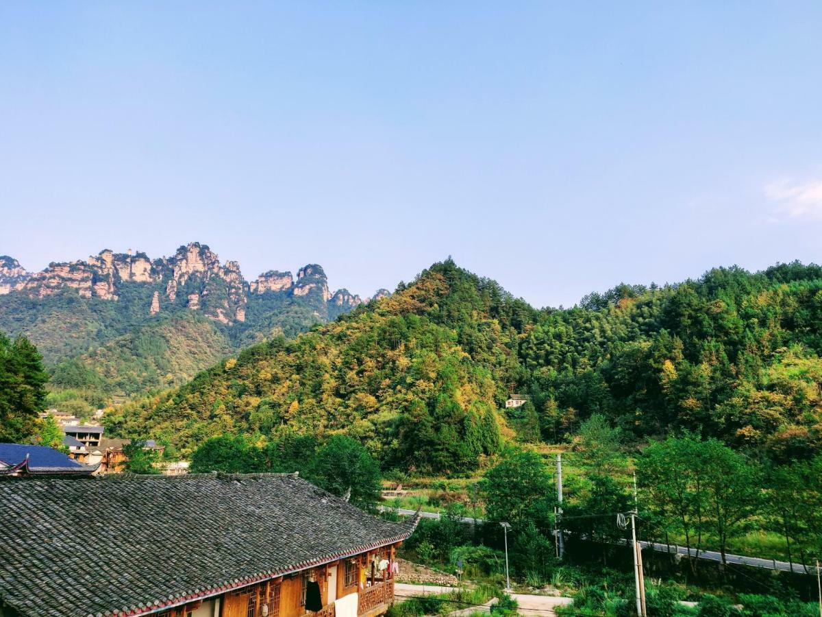 Whispering Mountains Boutique Hotel จางเจียเจี้ย ภายนอก รูปภาพ