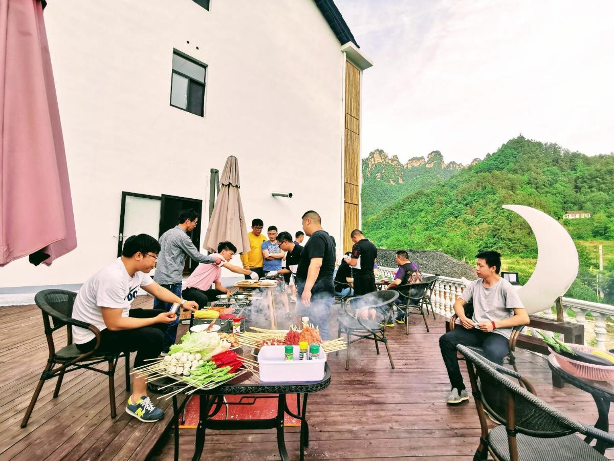 Whispering Mountains Boutique Hotel จางเจียเจี้ย ภายนอก รูปภาพ