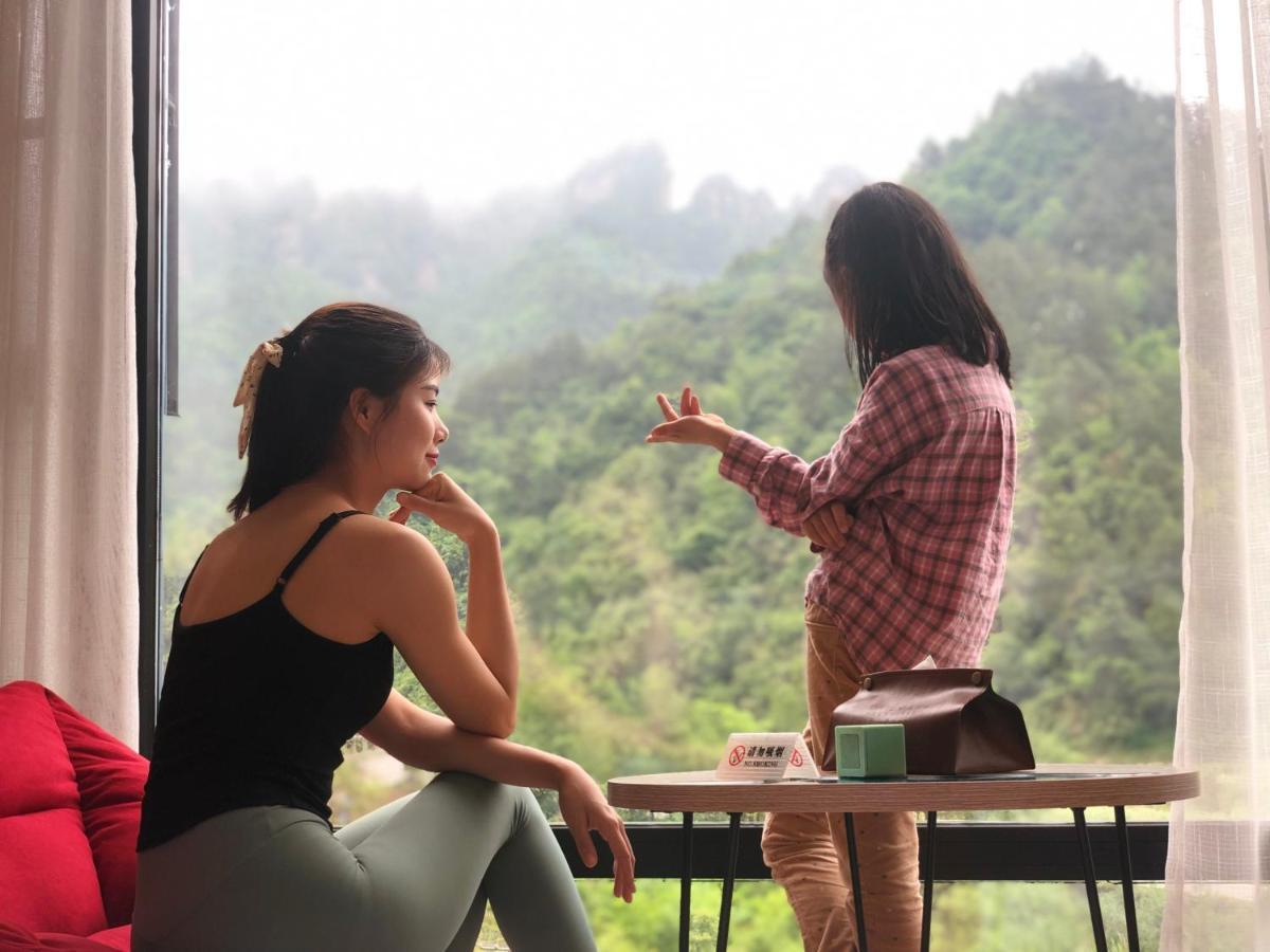 Whispering Mountains Boutique Hotel จางเจียเจี้ย ภายนอก รูปภาพ